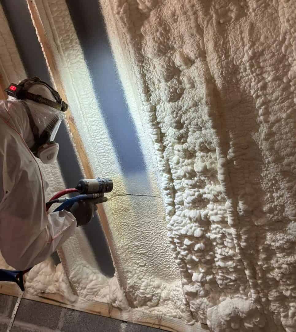 http://Spray%20foam%20insulation%20being%20applied%20to%20a%20wall%20for%20energy%20efficiency.
